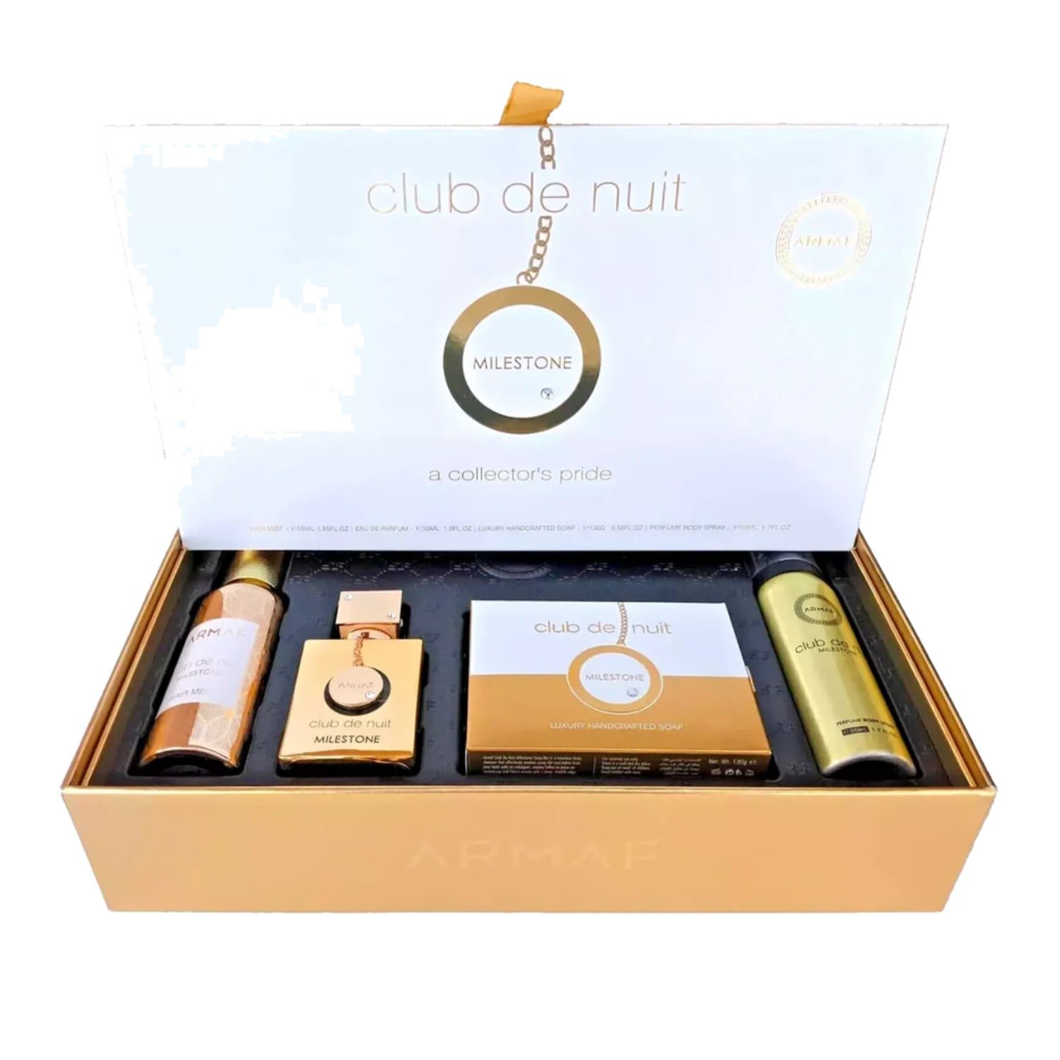 armaf-club-de-nuit-milestone-4-piece-gift-set.jpg Armaf Club de Nuit Milestone 4 piece gift set with 30ml eau de parfum, hair mist, soap and body spray in open gold box